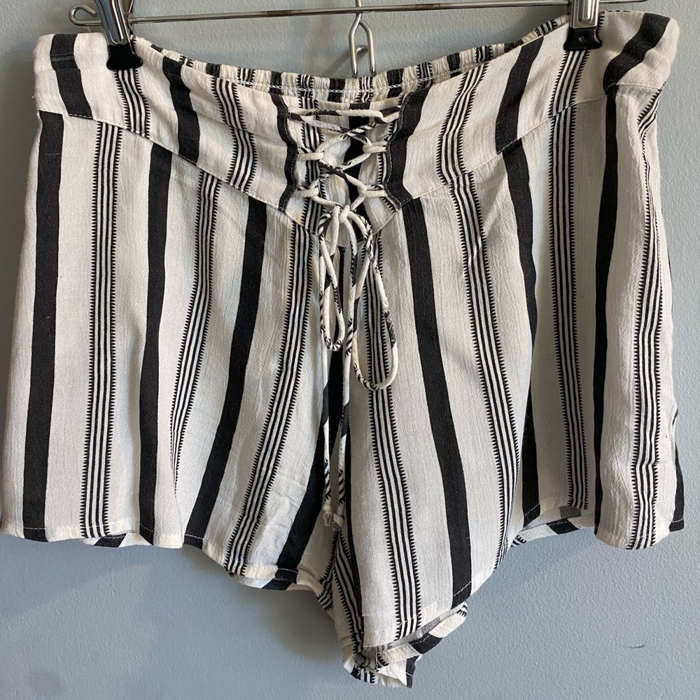 Billabong high-waisted shorts. Light and flowy material. Size medium.